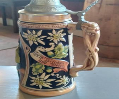 2 beautiful vintage beer steins, both are in excellent condition
