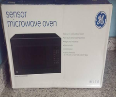 GE MICROWAVE NEW IN BOX
